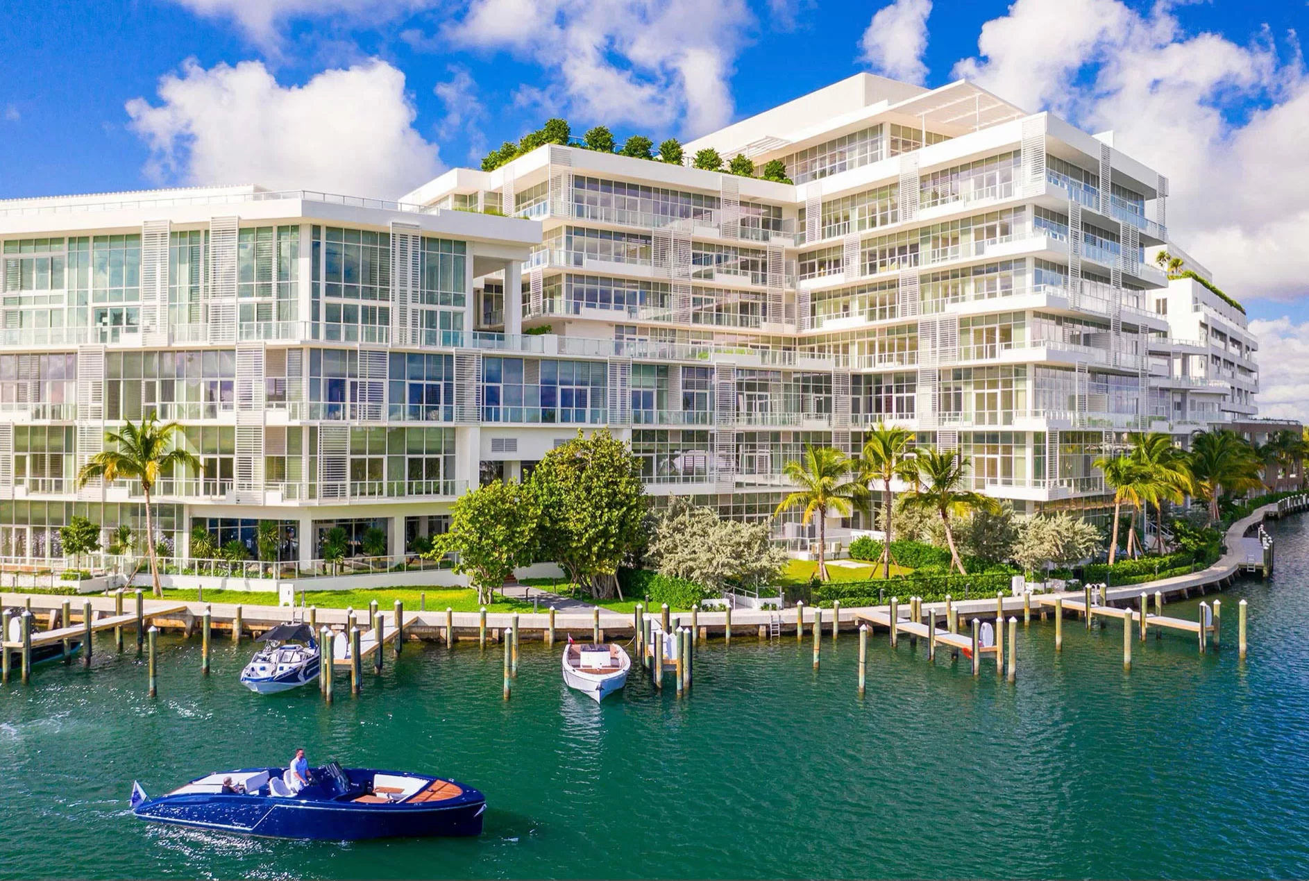 Ritz-Carlton Residences Miami — waterfront view of impact glass curtain wall from the bay